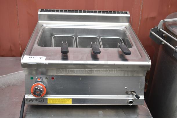 2022 Lotus CPT-66ET countertop electric pasta cooker, includes metal fry baskets, visible brand marking, appears gently used.