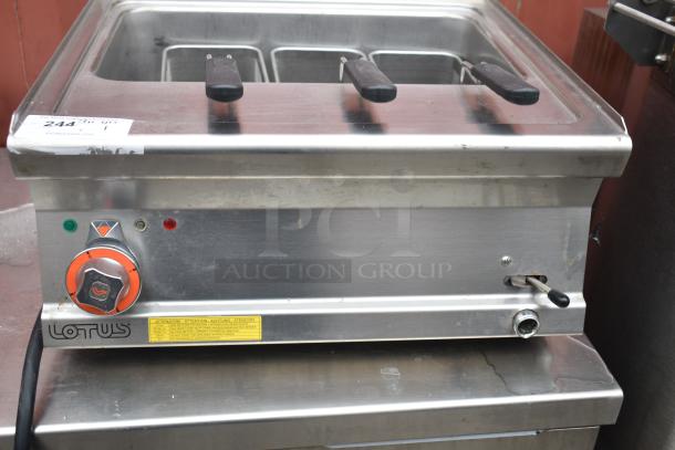 2022 Lotus CPT-66ET electric pasta cooker with metal fry baskets. Stainless steel, good condition, visible control knob.