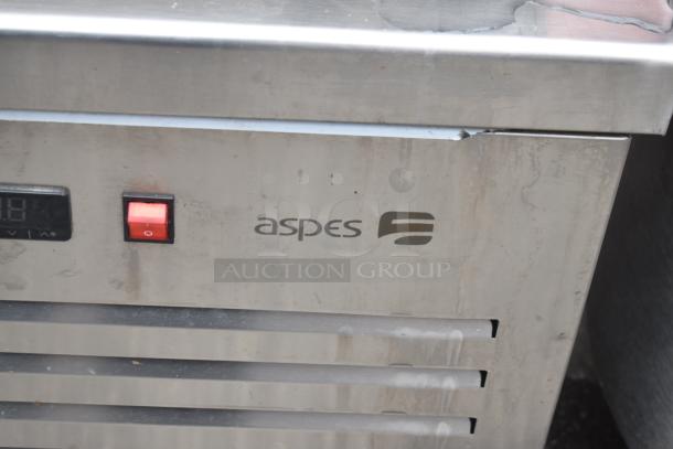 Aspes Commercial 2 Drawer Chef Base; 208 volts; stainless steel; visible Aspes logo; slight exterior wear.