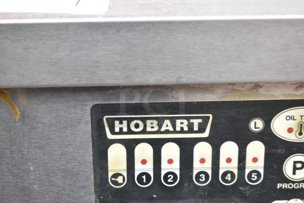 Hobart 1HF85C floor deep fat fryer, stainless steel, visible control panel, used condition, model label intact.