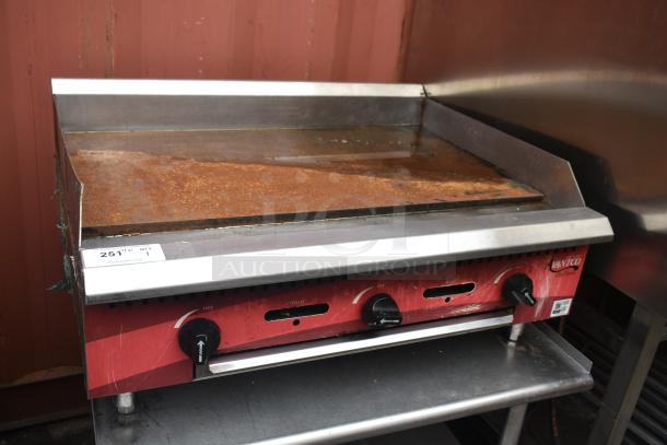 Avantco Commercial Flat Top Griddle on equipment stand, used condition, visible rust, three control knobs, item tag "251" shown.