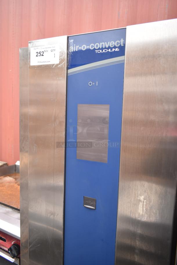 Electrolux Air-o-convect Touchline commercial convection oven on stand with casters, stainless steel, visible model number tag.
