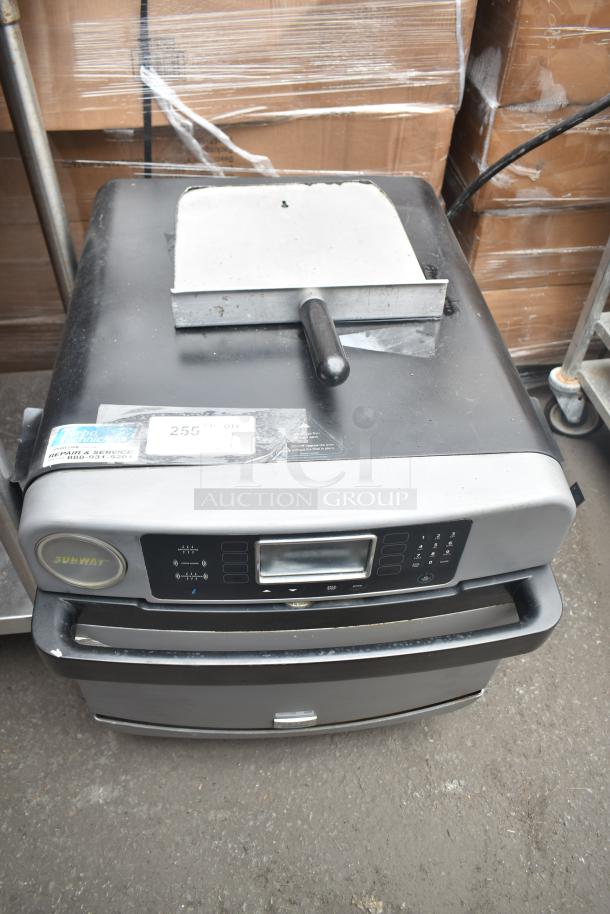 Turbochef Encore 2 commercial countertop rapid cook oven with paddle, 208/240V, 1 Phase, in used condition. Visible label.