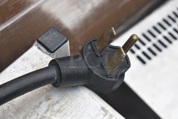 Turbochef Encore 2 commercial countertop electric rapid cook oven, 208/240 volts, 1 phase, power cord detail shown.