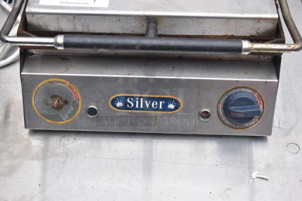 Isikgaz 2030-12 countertop panini press, stainless steel, 220-230V, single phase. Shows wear with label “Silver.”