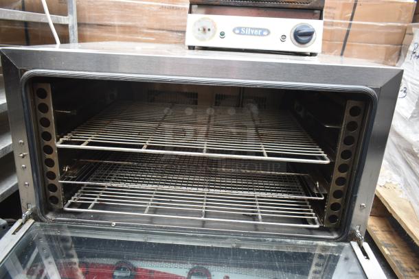 Empero EMP.PFE4-U commercial countertop convection oven, stainless steel, dual racks, good condition.