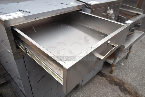 Brand new Lavex 257RD2523EBC mobile desk, stainless steel with drawer, enclosed base, scratch and dent condition.