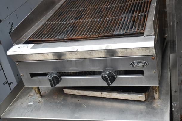 DCS Commercial Gas Charbroiler Grill on stand, stainless steel, dual knobs, used condition, manufacturer's logo visible.