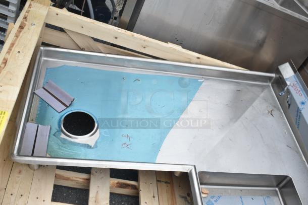 Brand new Eagle Group SDTCIL-60-16/3 60" L-shaped stainless steel dishtable, 16 gauge, left dishlanding, no legs, minor dents.