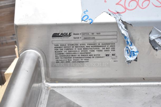BRAND NEW Eagle Group SDTCIL-60-16/3 60" L-Shape Dishtable in scratched stainless steel. Missing legs. Model, serial details visible.
