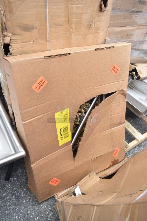 Crate of 3 brand new, scratch and dent items with racks; visible box damage; hardware enclosed stickers present.