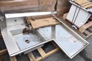 BRAND NEW Regency 600DDTI48R 4' 16-Gauge Stainless Steel Soiled L-Shape Dishtable with visible scratches and dents.