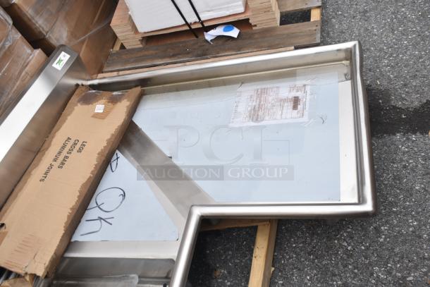 "Brand new Regency 600DDTI48R 4' 16-gauge stainless steel soiled L-shape dishtable, right island, scratch and dent condition."