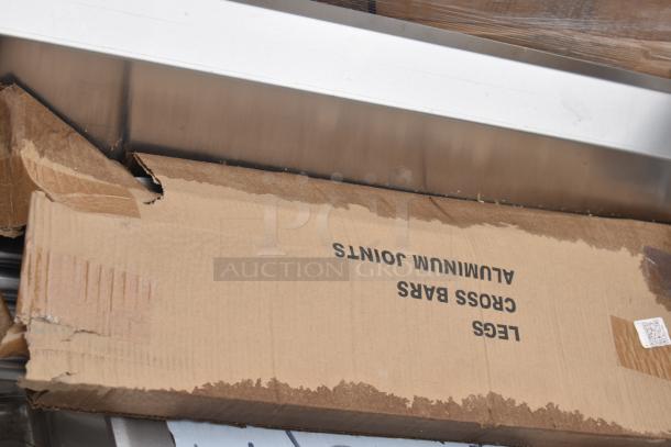 BRAND NEW 4' Regency 600DDTI48R dishtable, 16-gauge stainless steel, soiled L-shape, right island, slight scratches.