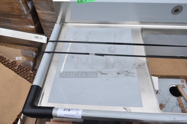 New Regency 600S1242424L single bay sink with left side drain board, scratch and dent, metal finish, auction tag visible.