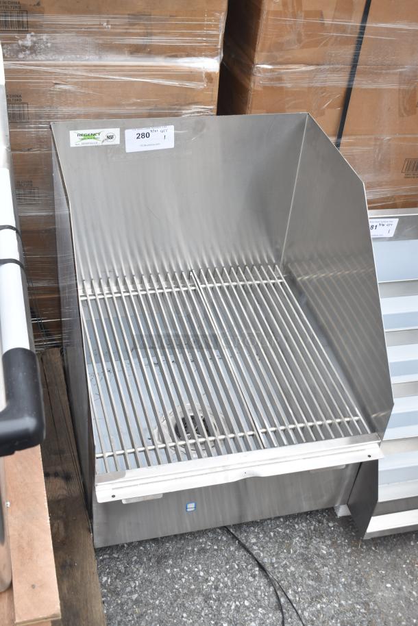 Brand new Regency 600SMFSS21LR stainless steel mop sink with side splash guards, 22"x21 3/8"x10" bowl, slight scratches.