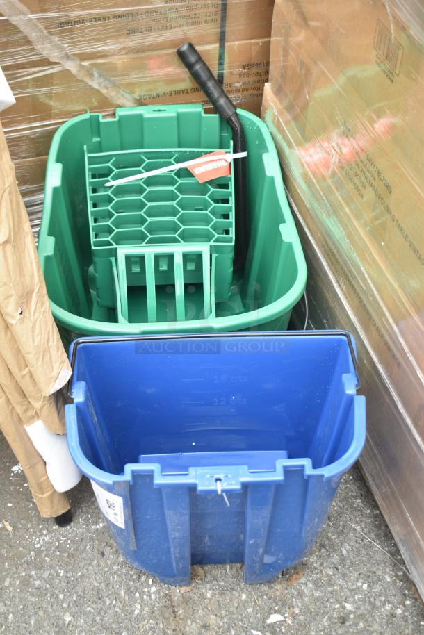 Sparta green mop bucket and blue bucket, both brand new with minor scratches and dents; green bucket includes wringer and handle.