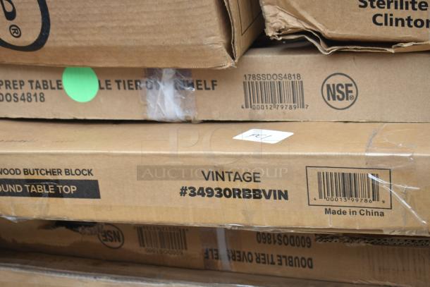 Boxes labeled "Vintage" and "NSF," containing new scratch and dent items like shelves and bun pan, with barcodes visible.