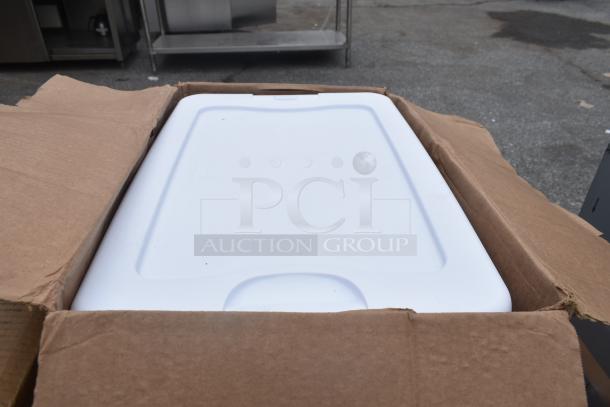Cardboard box with a white plastic lid visible inside. Part of a lot of 9 new scratch and dent items, including shelves.