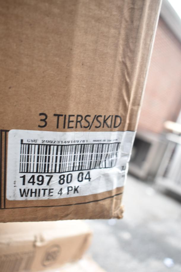 Cardboard box label showing "3 TIERS/SKID" and barcode with "1497 80 04 WHITE 4 PK" for auction items.