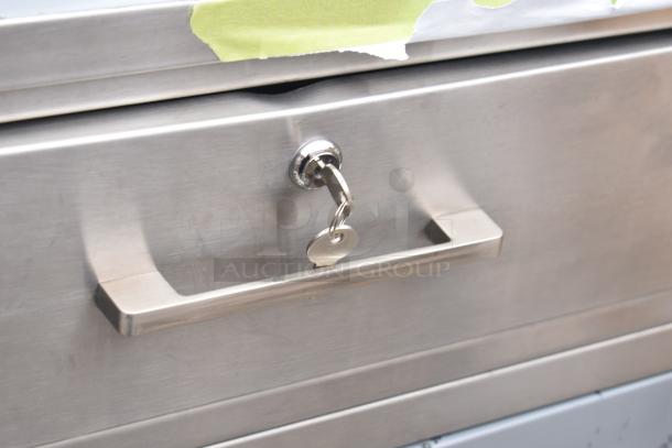 BRAND NEW Lavex 257RD2523EBC mobile desk, scratch and dent condition, stainless finish with key-locked drawer.