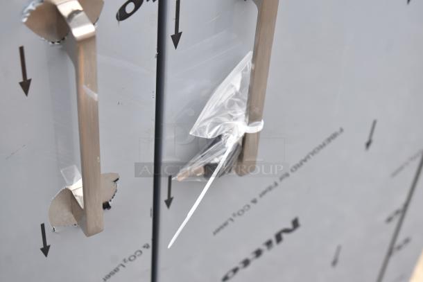 Brand new Lavex 257RD2523EBC mobile desk, shown with minor scratches, featuring an enclosed base and protective wrapping.