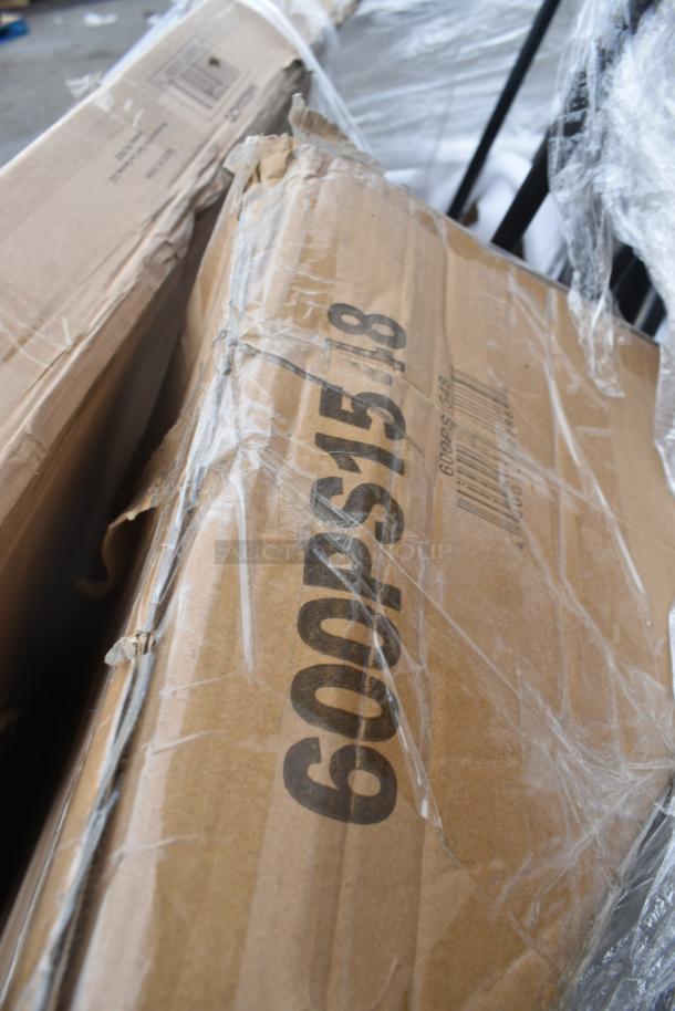 Packaging of new scratch and dent items including chairs, ingredient bin, and table. Visible barcode and damaged box.