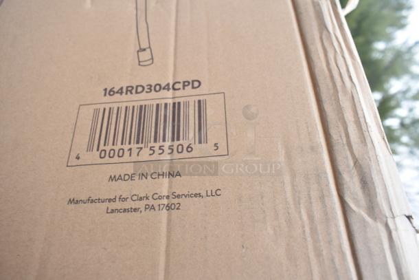Cardboard box showing barcode and text "164RD304CPD, Made in China, Manufactured for Clark Core Services, LLC, Lancaster, PA 17602".