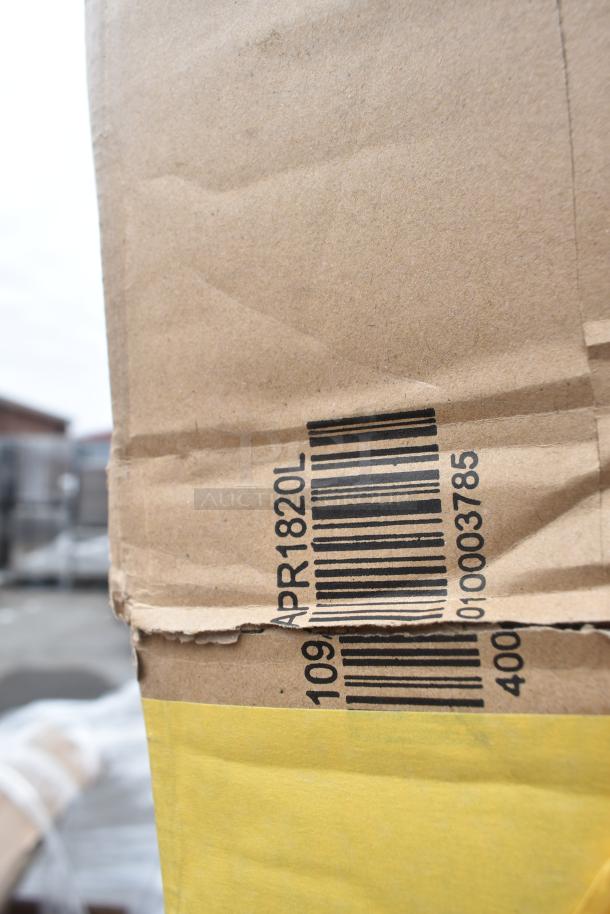 Package with visible barcode and "APR1820L" label, indicating a scratch and dent item set. Contains shelf, work table, pan rack, ingredient bin.