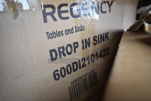 Cardboard box labeled "REGENCY Tables and Sinks, DROP IN SINK 600DI2101420"; brand new condition.