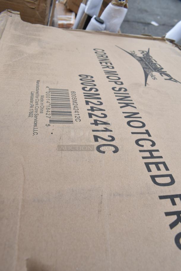 Cardboard box labeled Regency Corner Mop Sink 600SM242412C, new condition, includes barcode and manufacturer details.