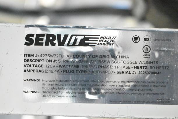 Label of ServIt 423SW72TLHA, 72" lighted strip warmer. Details: 120V, 1965W, single-phase. Hardwired plug, serial 20250700043.