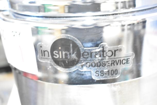 Brand new Insinkerator SS100-47 commercial garbage disposer, 1 hp, scratch and dent, 208/230/460V, 3 phase, visible label.