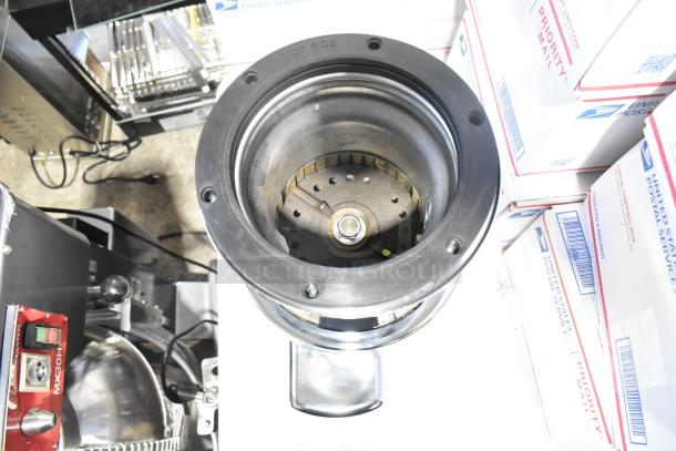 BRAND NEW SCRATCH AND DENT Insinkerator SS100-47 commercial garbage disposer, 1 hp, 208/230/460 Volts, 3 Phase, top view.