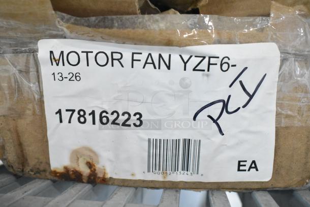 Brand new Avantco 17816223 fan motor, 120V, 33W, with visible scratch and dent. Label indicates "MOTOR FAN YZF6-".