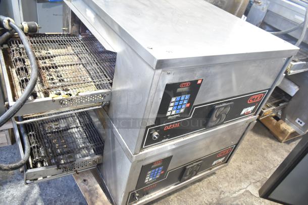 Two 2021 Middleby Marshall CTX DZ33I stainless steel conveyor pizza ovens on casters. 208V, 3/1 phase, commercial use.