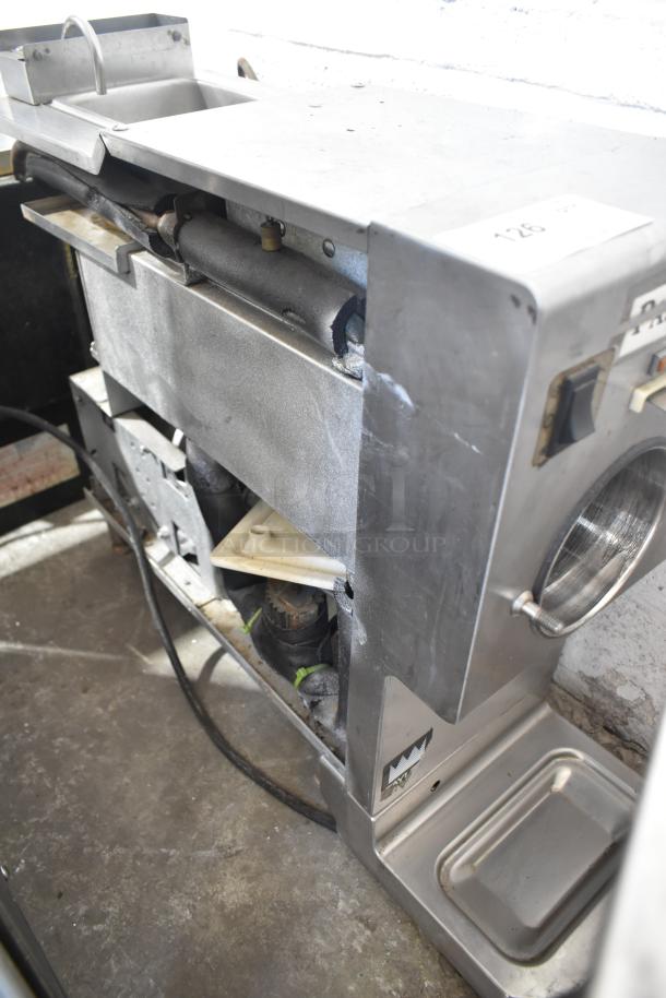 Taylor Commercial Countertop Single Flavor Frozen Beverage Machine in used condition. 115 volts, 1 phase. Stainless steel exterior.