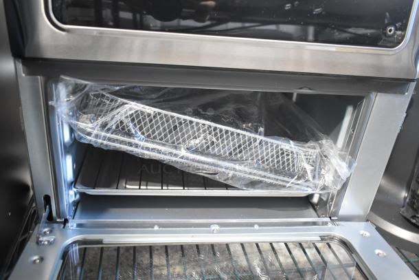 Chefman RJ50-SST2-P ExacTemp Air Fryer Toaster Oven Combo, new with minor scratches. Includes trays in packaging. 115V, 1 Phase.