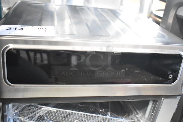Chefman RJ50-SST2-P ExacTemp air fryer toaster oven, 115V, new with minor scratches, auction tag visible.