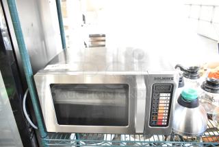 Solwave 180MW1000SS commercial microwave, like new, stainless steel, push button controls, 120V, 1 phase, model EM025FJT-S0SA00.