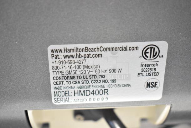 Brand new scratch and dent Hamilton Beach 410HMD400R Triple Spindle Drink Mixer; 120 volts, 1 phase. Model: HMD400R.
