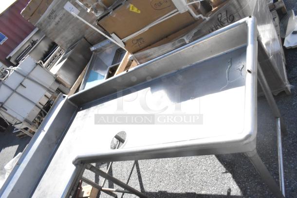 Commercial right-side dirty dish table, stainless steel, featuring a pre-rinse hole. Moderate wear visible, ideal for kitchens.