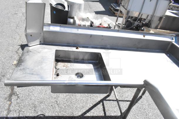 Commercial stainless steel right side dirty dish table, features sink basin, drainage, some wear and rust visible.