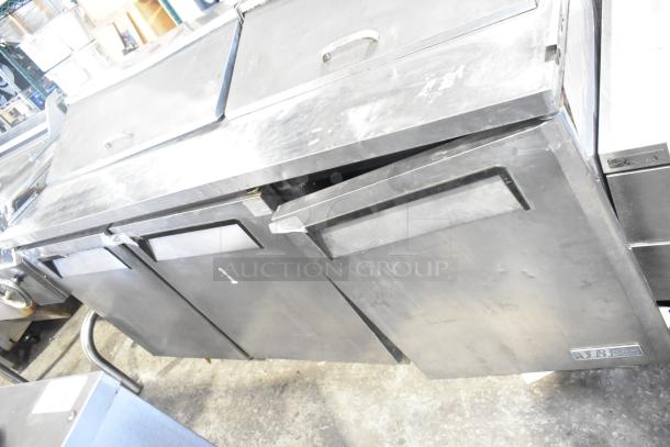 Turbo Air MST-72 commercial sandwich prep table, stainless steel, on casters. Features Mega Top, 115V, 1 Phase.
