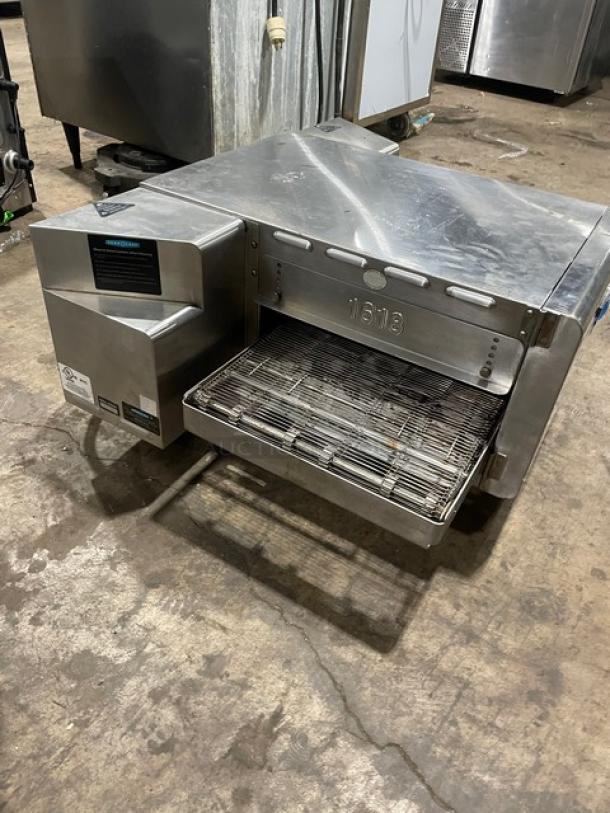 Turbo Chef HHC1618 stainless steel conveyor oven, 2019 model, electric, on legs. Features impingement cooking.