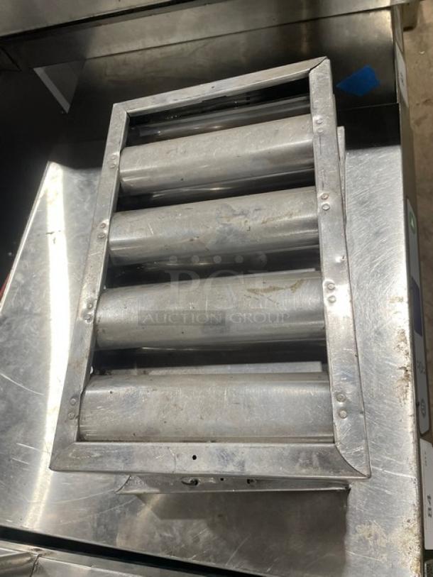 Turbo Chef HHC1618 stainless steel pizza conveyor oven part, shown on a metallic surface, highlights impingement mechanism.