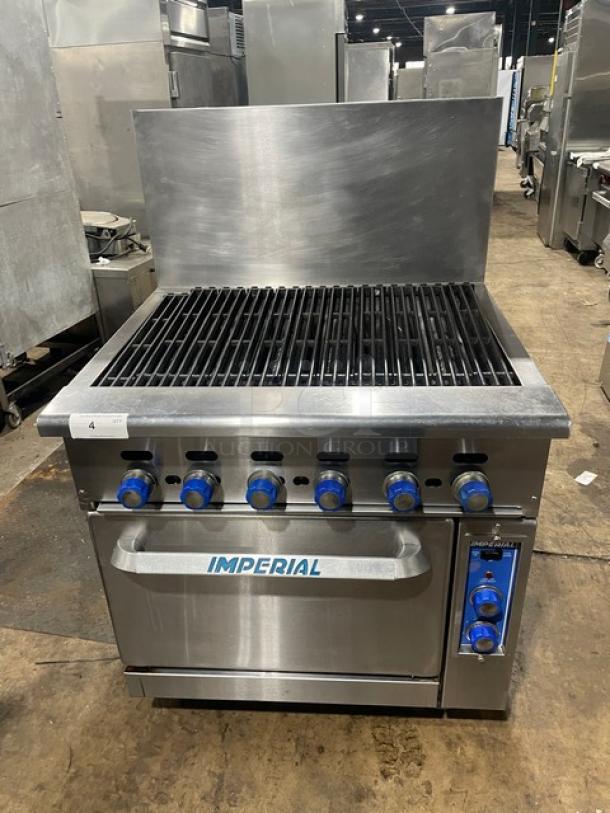 Imperial commercial stainless steel gas char broiler and convection oven combo with backsplash, wired oven rack, on casters.