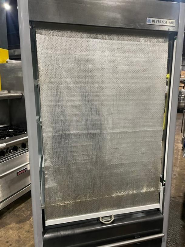 Beverage Air VM12 refrigerated open merchandiser display case, white, multi-tier, adjustable shelving, model: VM12, serial: 0426006-33154-0, 120V 1 Phase.