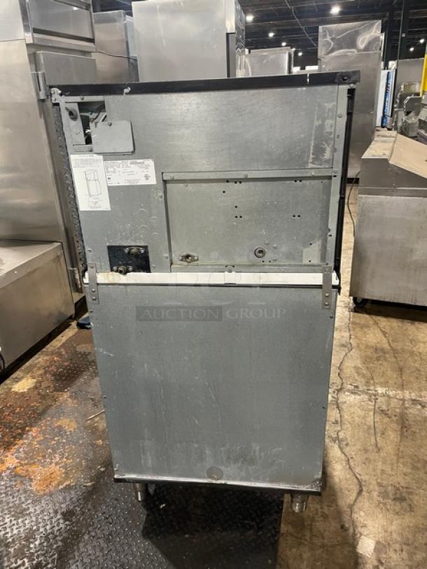 Manitowoc Koolaire KY0350W-161 stainless steel ice maker, model and serial numbers visible, on legs, used condition.