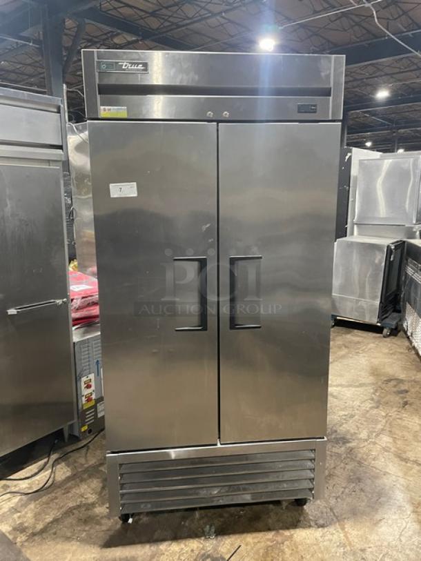 True T-35-HC commercial stainless steel 2-door reach-in refrigerator with wired rack, on casters, model T35HC.
